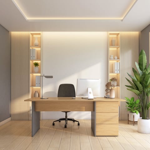 Minimalist home office with green plants and wooden furniture